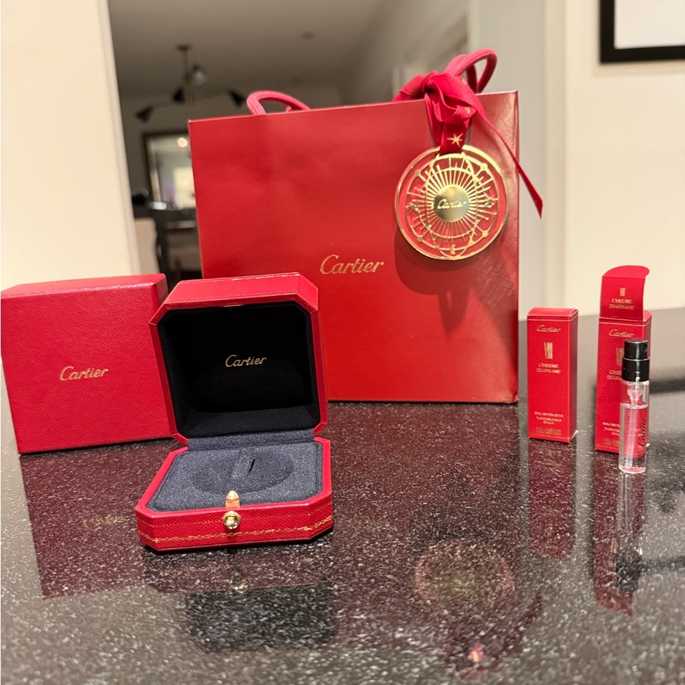 Cartier ring box, bag, holiday ribbon with gift tag